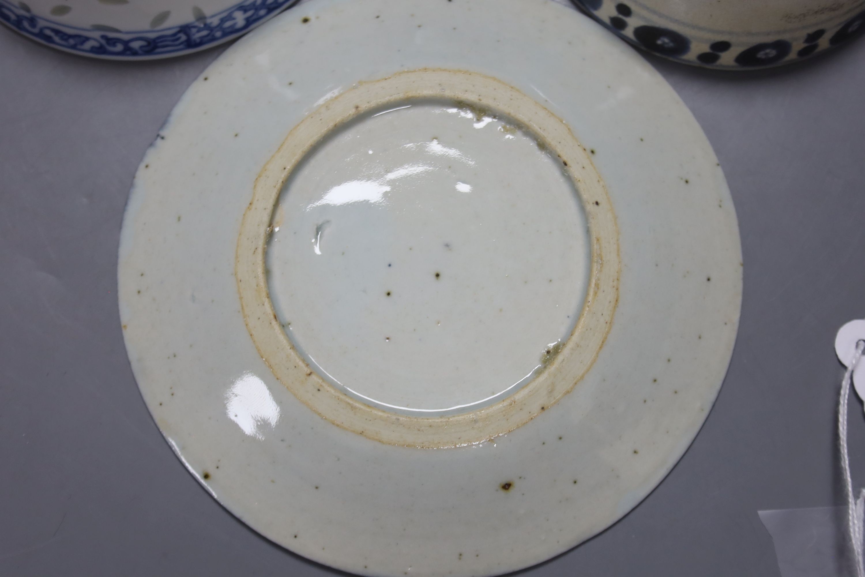 Four 19th century Chinese blue and white plates and two bowls, plates 15 cms diameter.